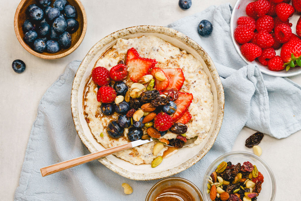 Breakfast Porridge - with Berries, Mixed Nuts and Cinnamon Honey | Harris Farm Online