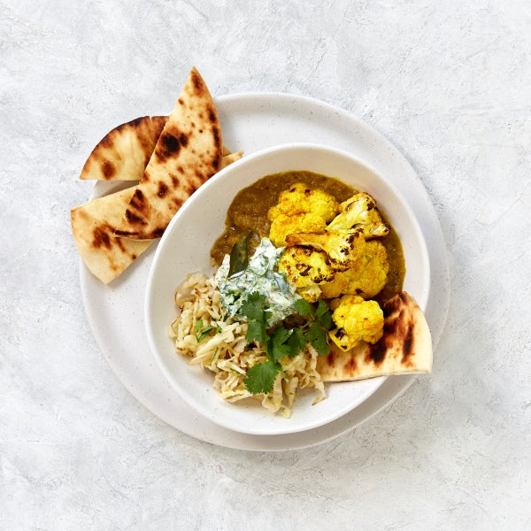 Dahl with Roasted Cauliflower, Saute'ed Cabbage and Spicy Raita