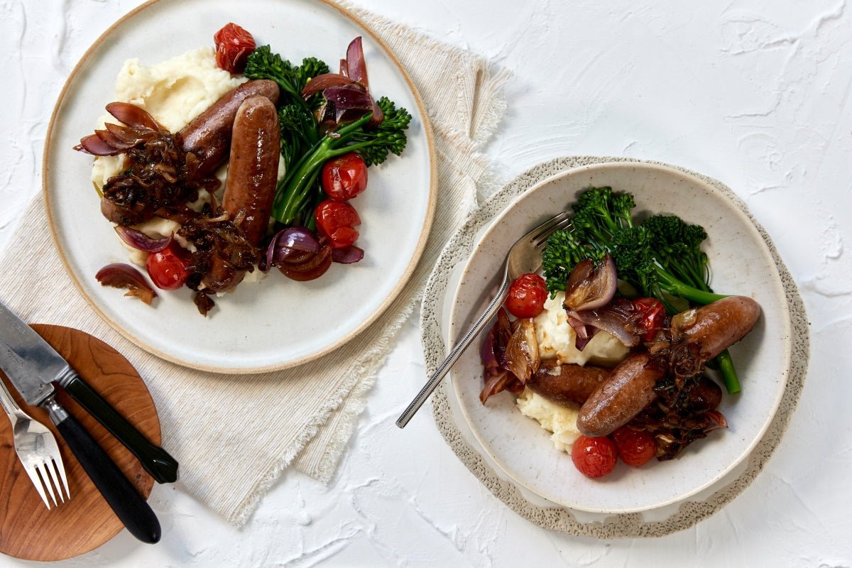Bangers and Mash with Broccolini and Roasted Tomatoes