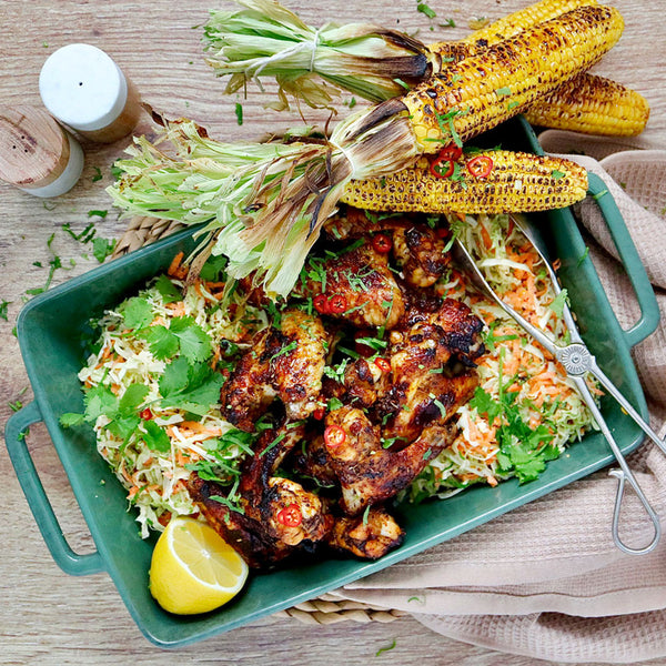 Cajun Spiced Chicken Drumsticks with Roasted Corn and Cabbage Slaw