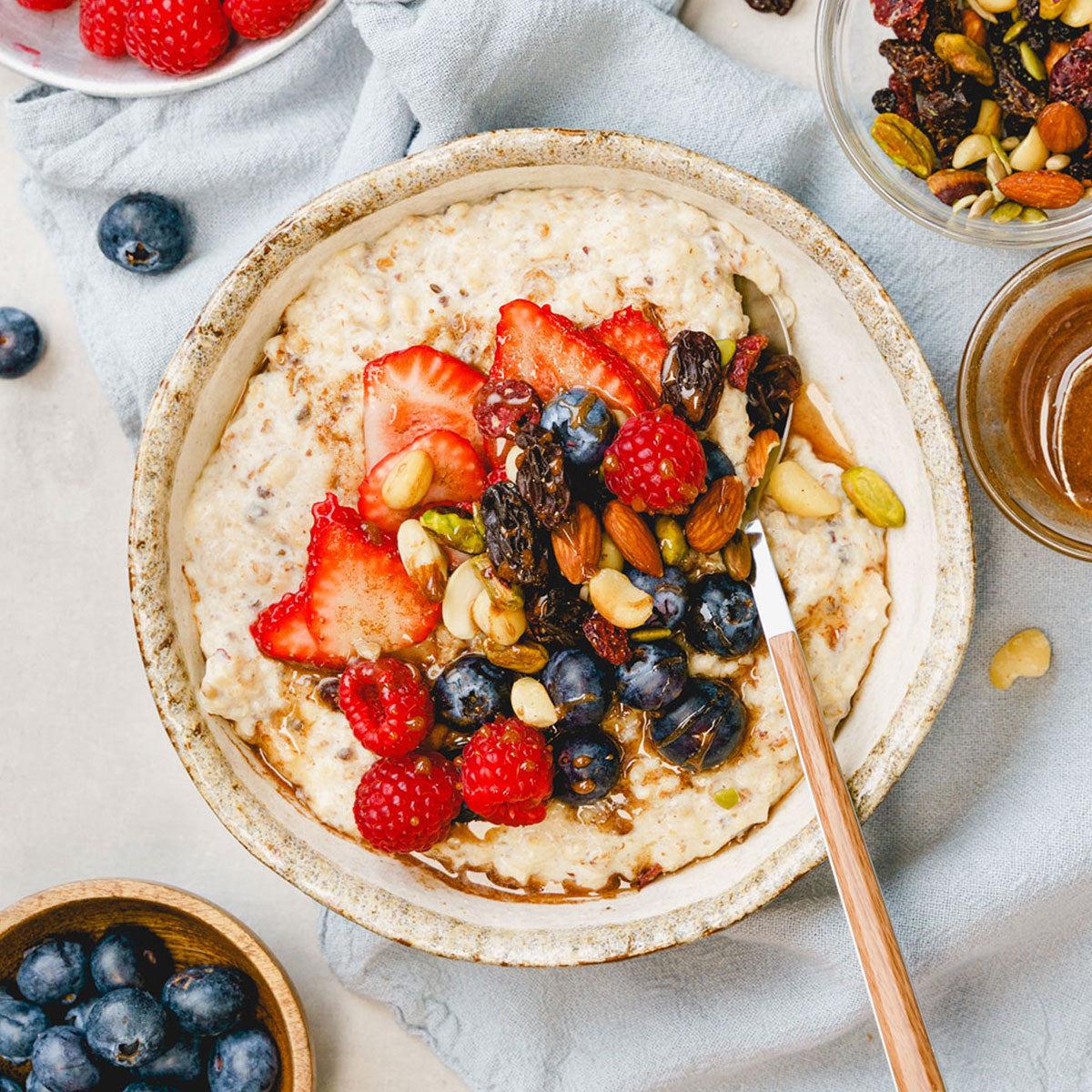 Breakfast Porridge - with Berries, Mixed Nuts and Cinnamon Honey | Harris Farm Online