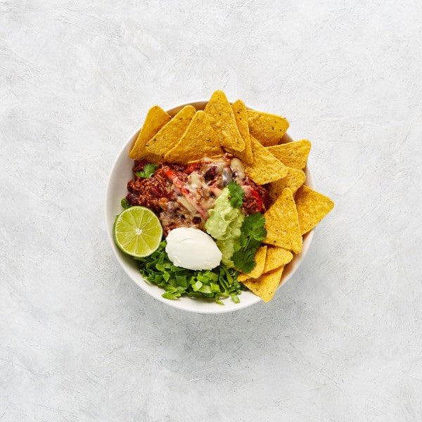 Mexican Beef Nachos with Beans, Guacamole and Sour Cream