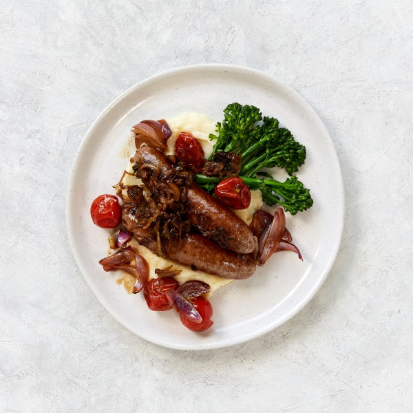 Bangers and Mash with Broccolini and Roasted Tomatoes
