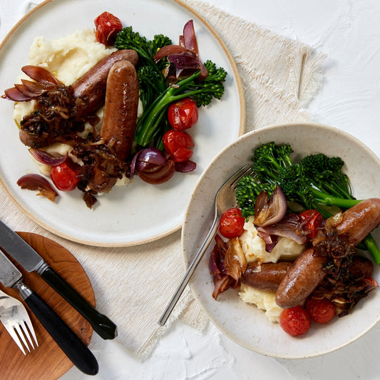 Bangers and Mash with Broccolini and Roasted Tomatoes